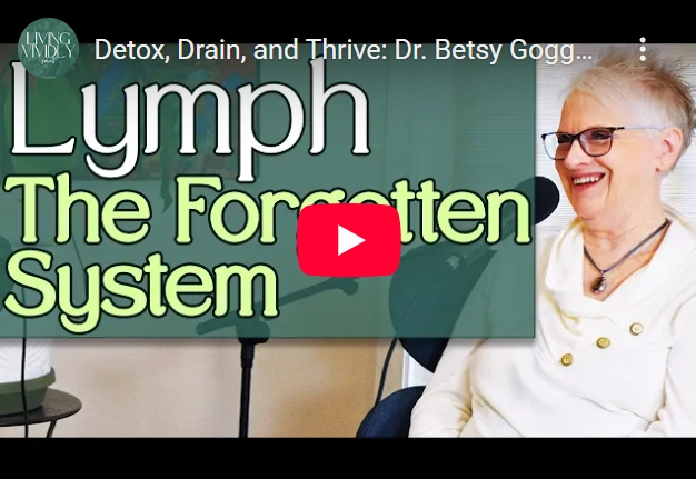 Dr. Betsy Goggan smiling during a podcast interview titled “Detox, Drain, and Thrive” with the caption “Lymph The Forgotten System” displayed on screen.
